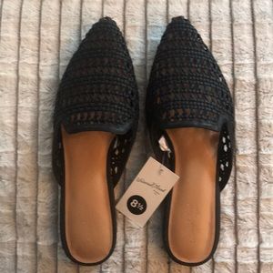 Black woven flats